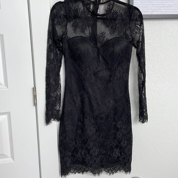 bebe Dresses & Skirts - Black lace BEBE dress, lined with molded bra size 6